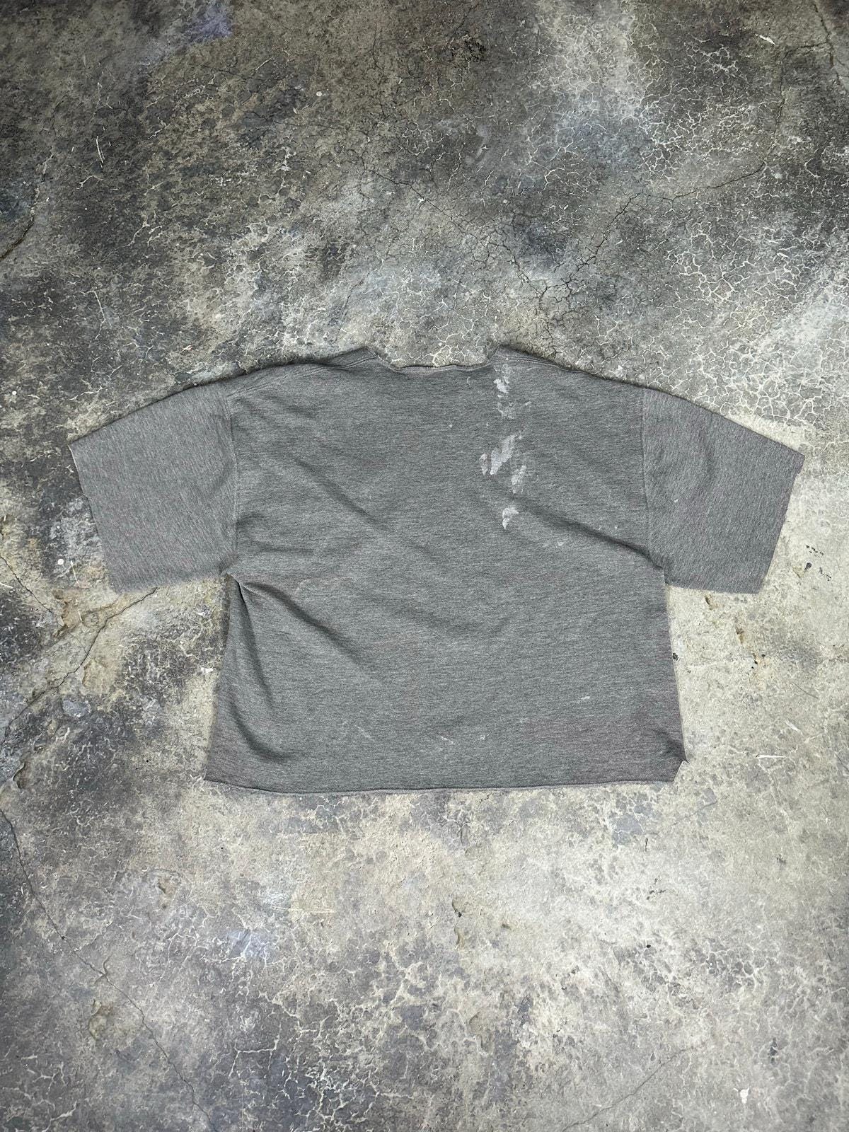 Thrashed Russel’s Athletics sweater