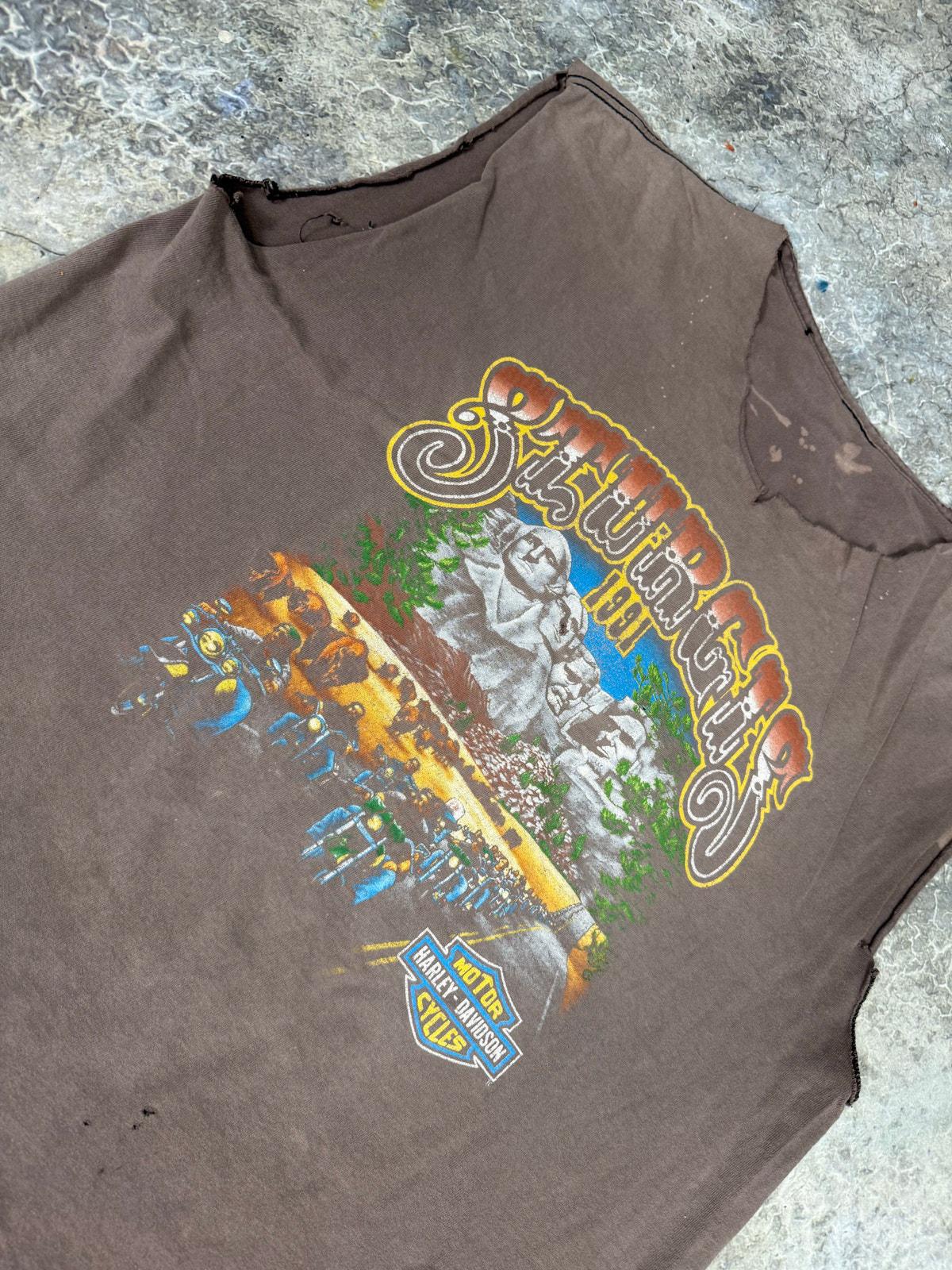 Thrashed Harley 90s cutoff