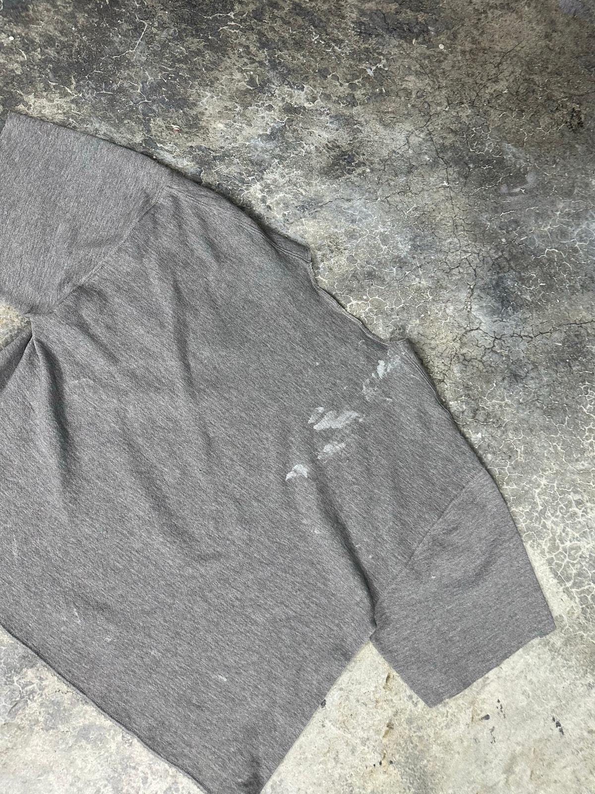 Thrashed Russel’s Athletics sweater
