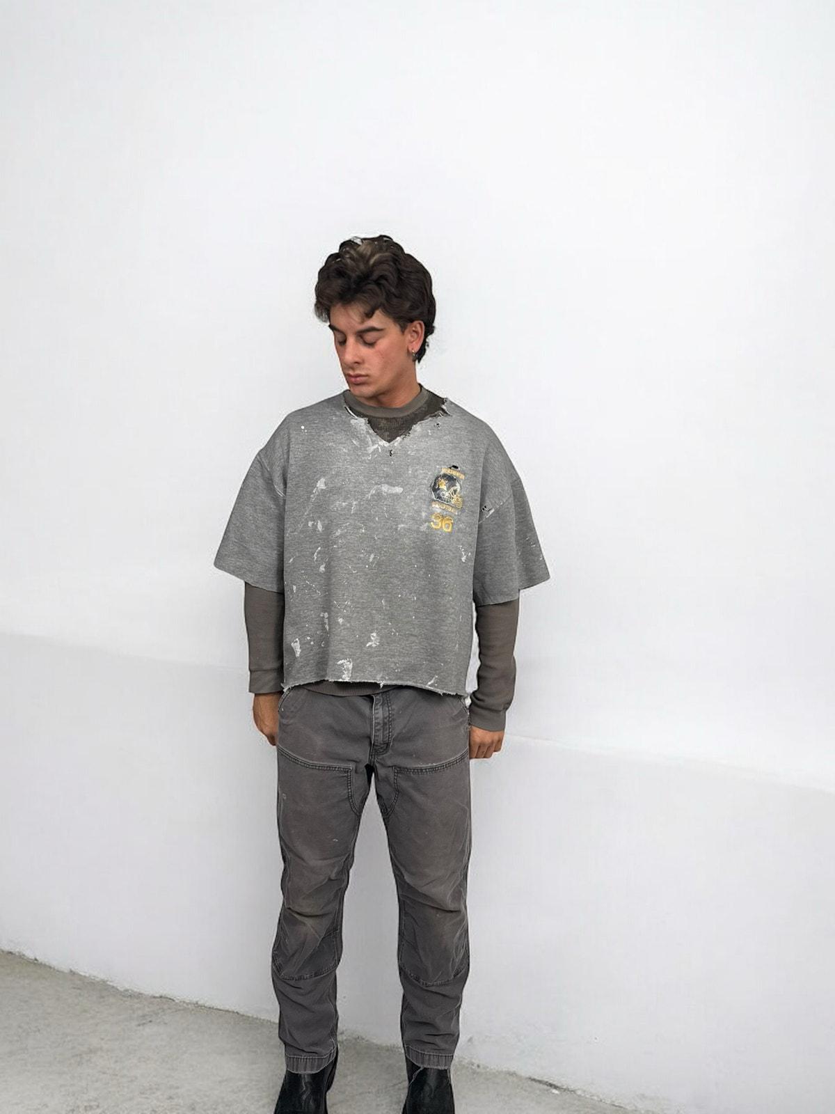 Thrashed Russel’s Athletics sweater