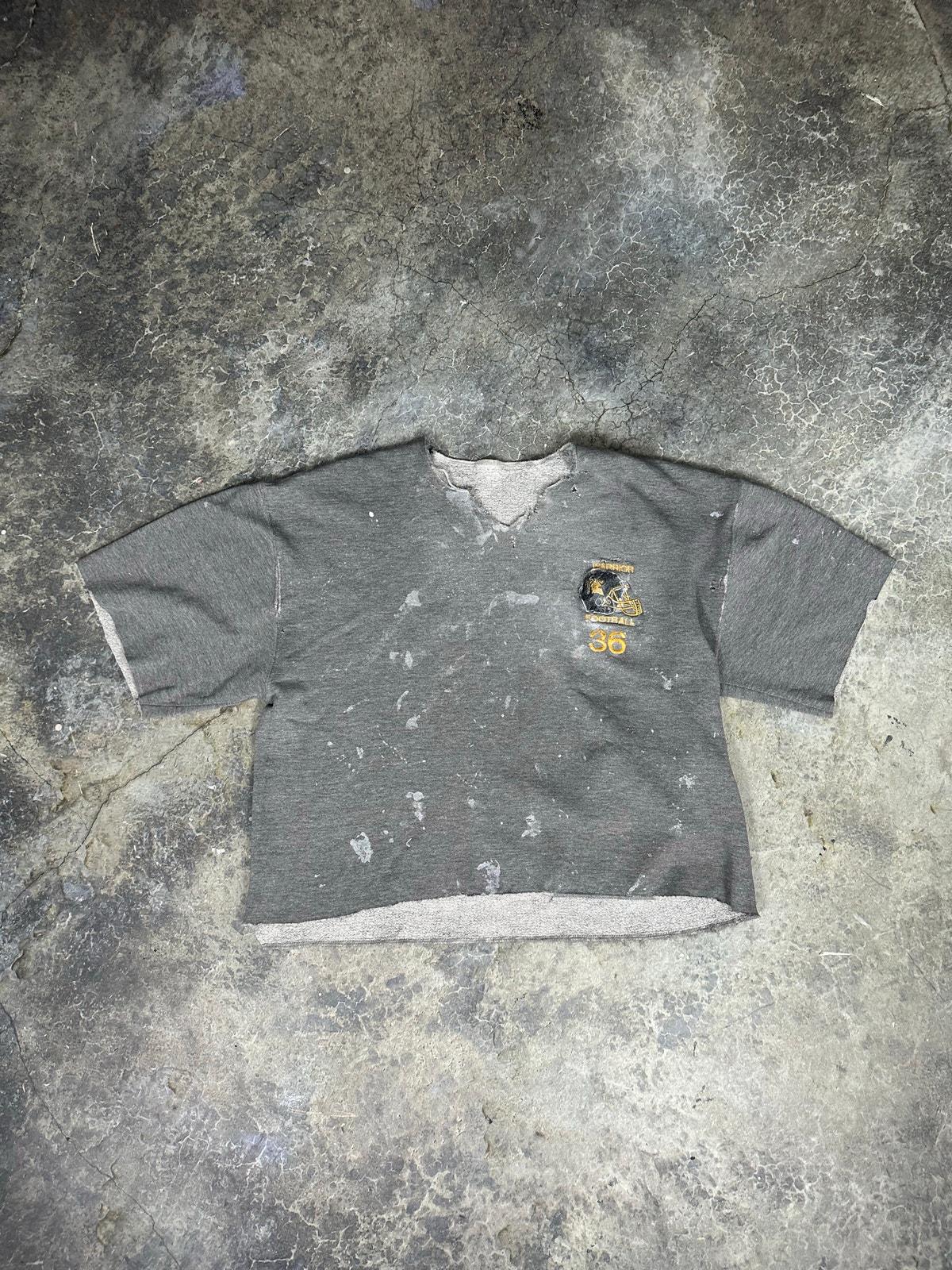 Thrashed Russel’s Athletics sweater