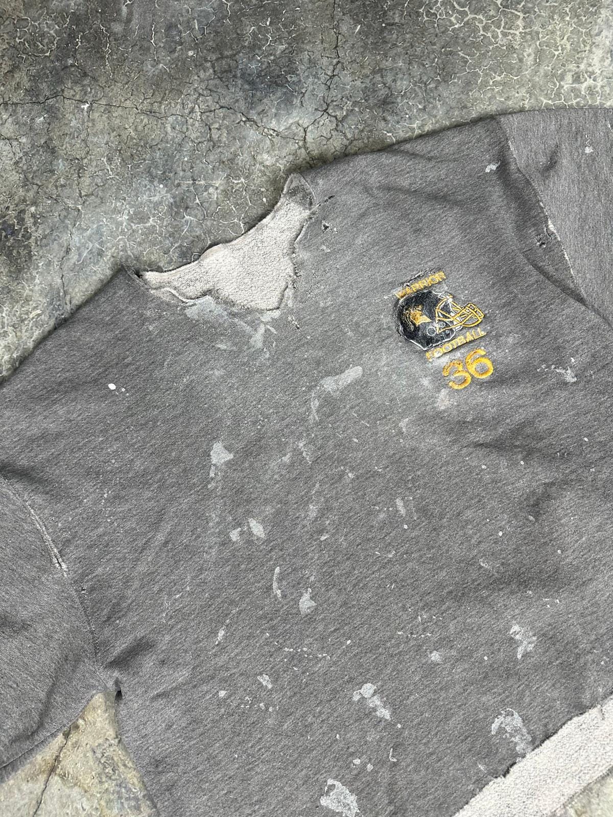 Thrashed Russel’s Athletics sweater
