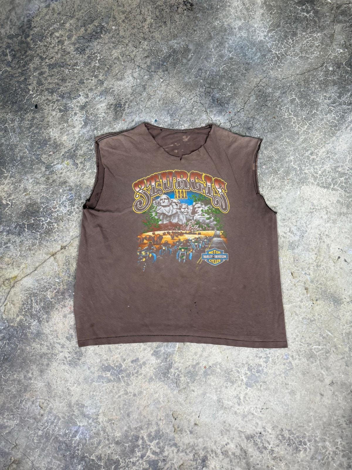 Thrashed Harley 90s cutoff